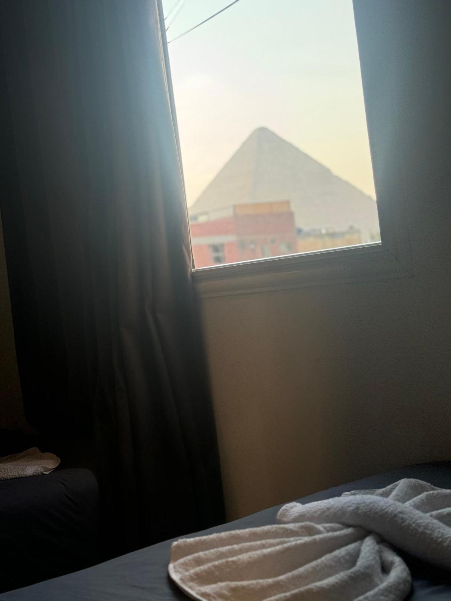 Pyramids And Sphinx Hotel Kafret el-Gabal Екстериор снимка