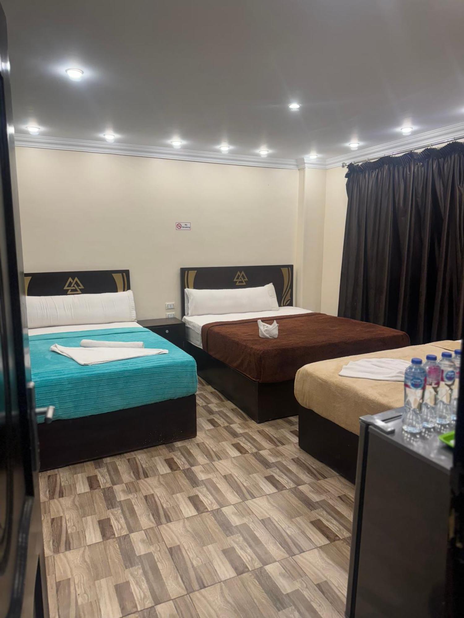 Pyramids And Sphinx Hotel Kafret el-Gabal Екстериор снимка